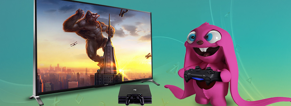 Fernseher mit King Kong vor einer Playstation und einer pinken Kreatur mit Controller